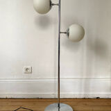 Vintage floor lamp has two opaque glass spheres