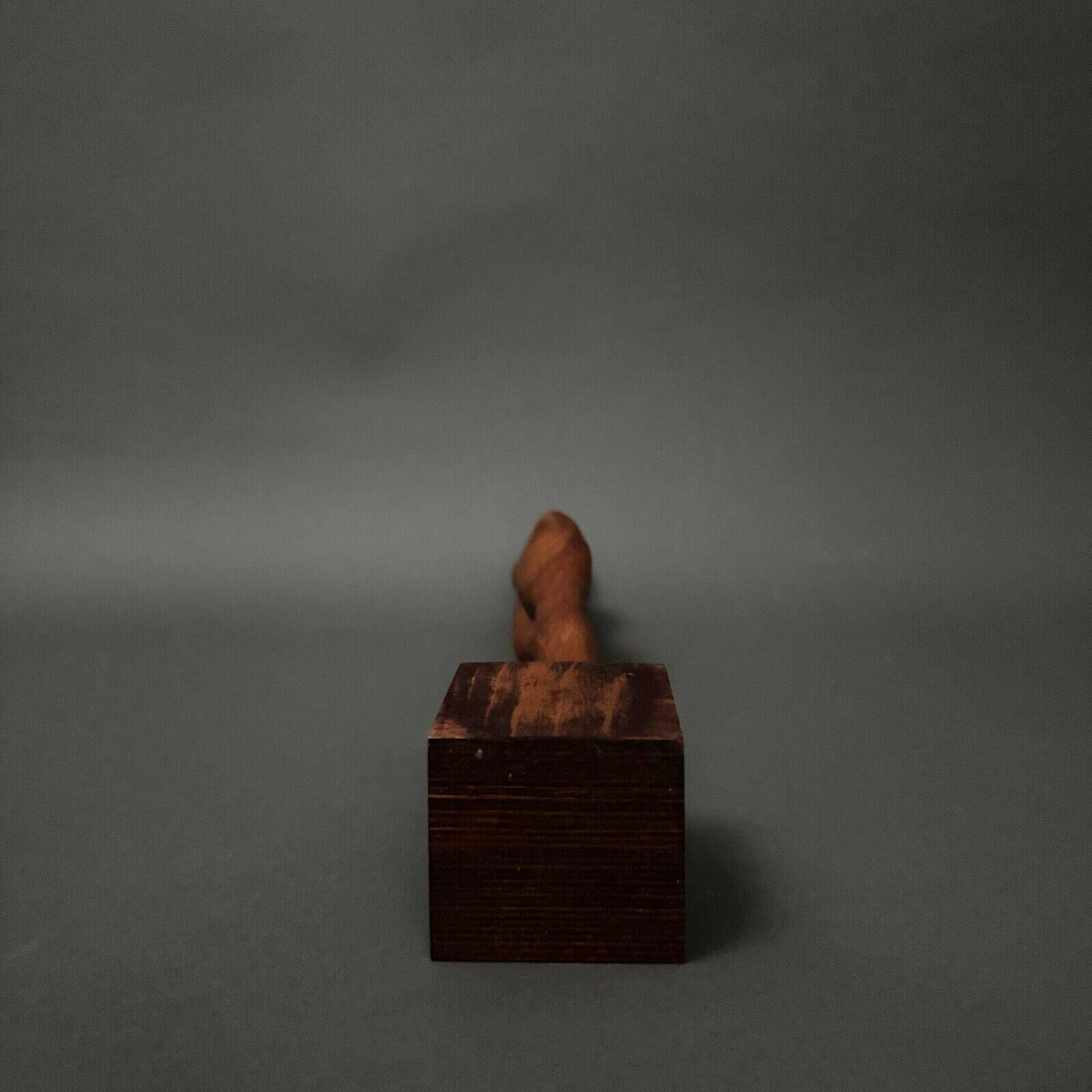 Carved wooden sculpture of a woman by Calin Hentea, 20th century