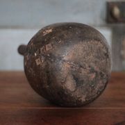 Vintage African wooden carved gourd bottle.