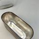 Silver-plated metal flask with leather and glass