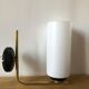 Pair of brass tube wall light and 1960s opalin glass