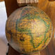 Pair of wooden bookends, rotating globes