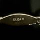 6 Silea knife holders in silver-colored metal stirrup shape