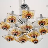 12-light Mazzega chandelier in amber and clear murano glass and chrome. Ita
