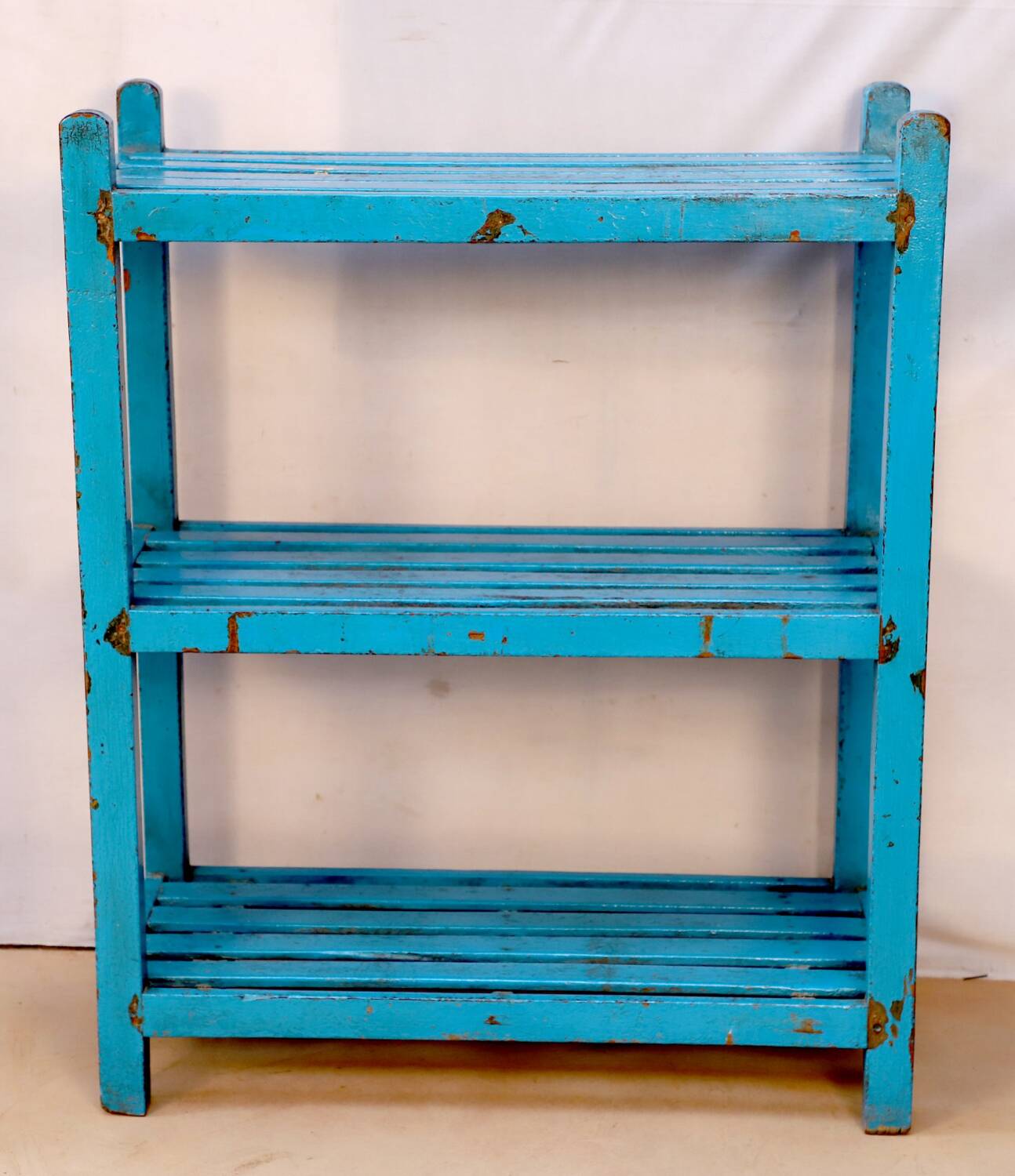 Teak shelf with original blue patina.