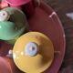 6 small porcelain cream pots from Limoges with a tray.