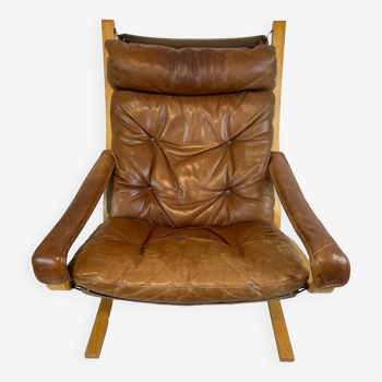 Beautiful vintage Westnofa chair model Siesta by Ingmar Relling. Leather Siësta chair. Nice patina.