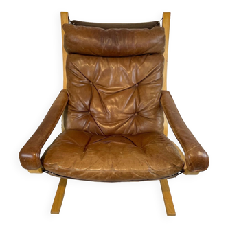 Beautiful vintage Westnofa chair model Siesta by Ingmar Relling. Leather Siësta chair. Nice patina.