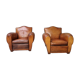 Paire de fauteuils club en cuir