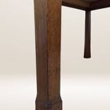 Ottoman coffee table in wood and gingham fabric.