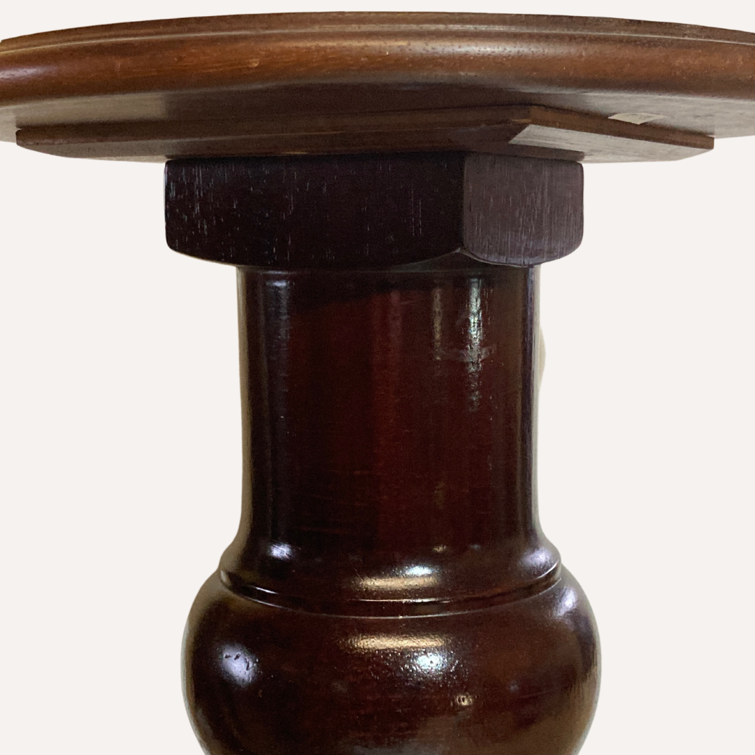 Vintage mahogany pedestal or side table with brass claw feet