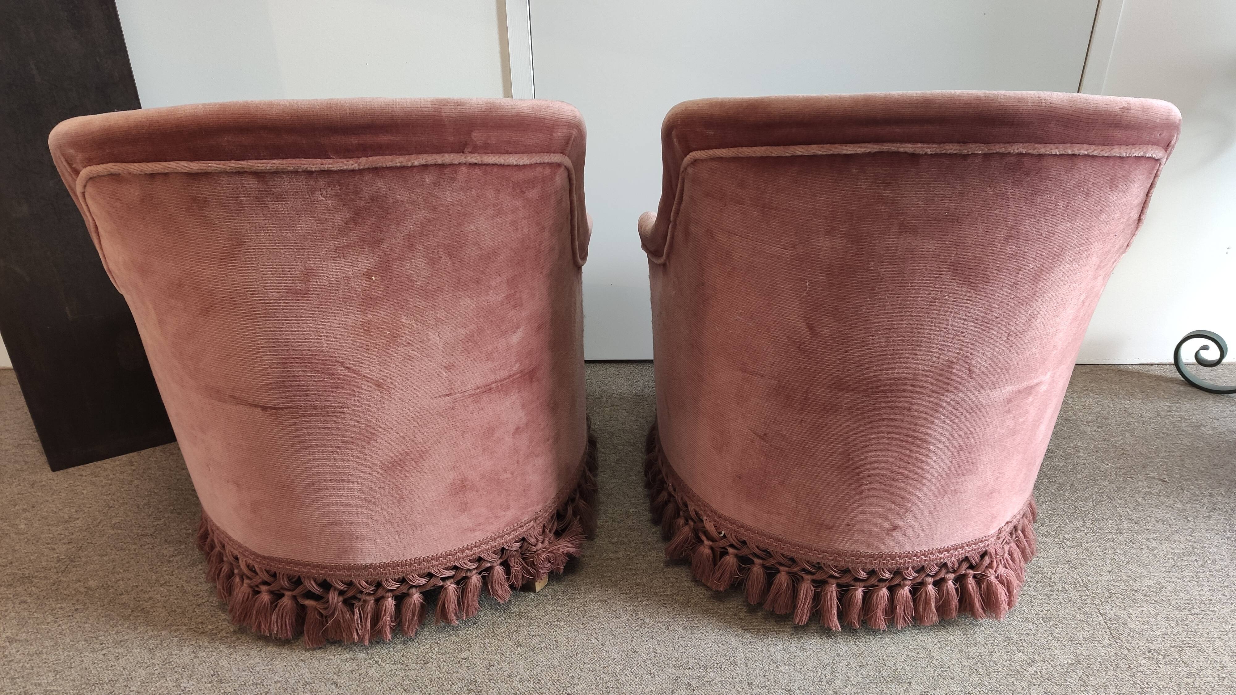 Pair of padded old pink armchairs