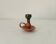 Vintage hand-held candlestick in glazed ceramic