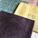 Suite of four tinted antique napkins