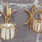 Pair of Louis Sognot rattan wall lights.