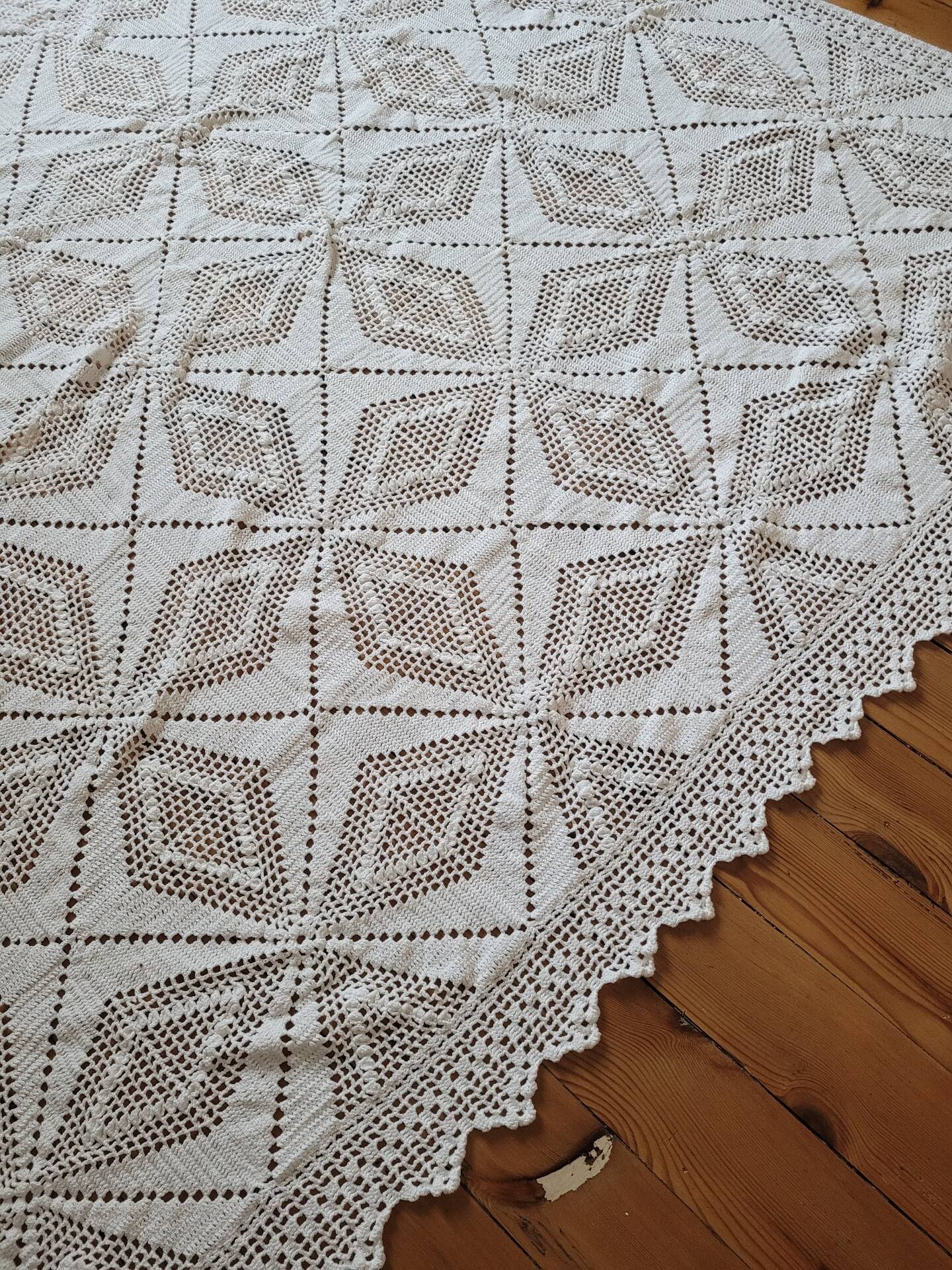 Large white crocheted bedspread