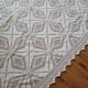 Large white crocheted bedspread