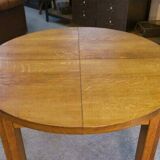 Round solid oak table by Maison Regain 1970s