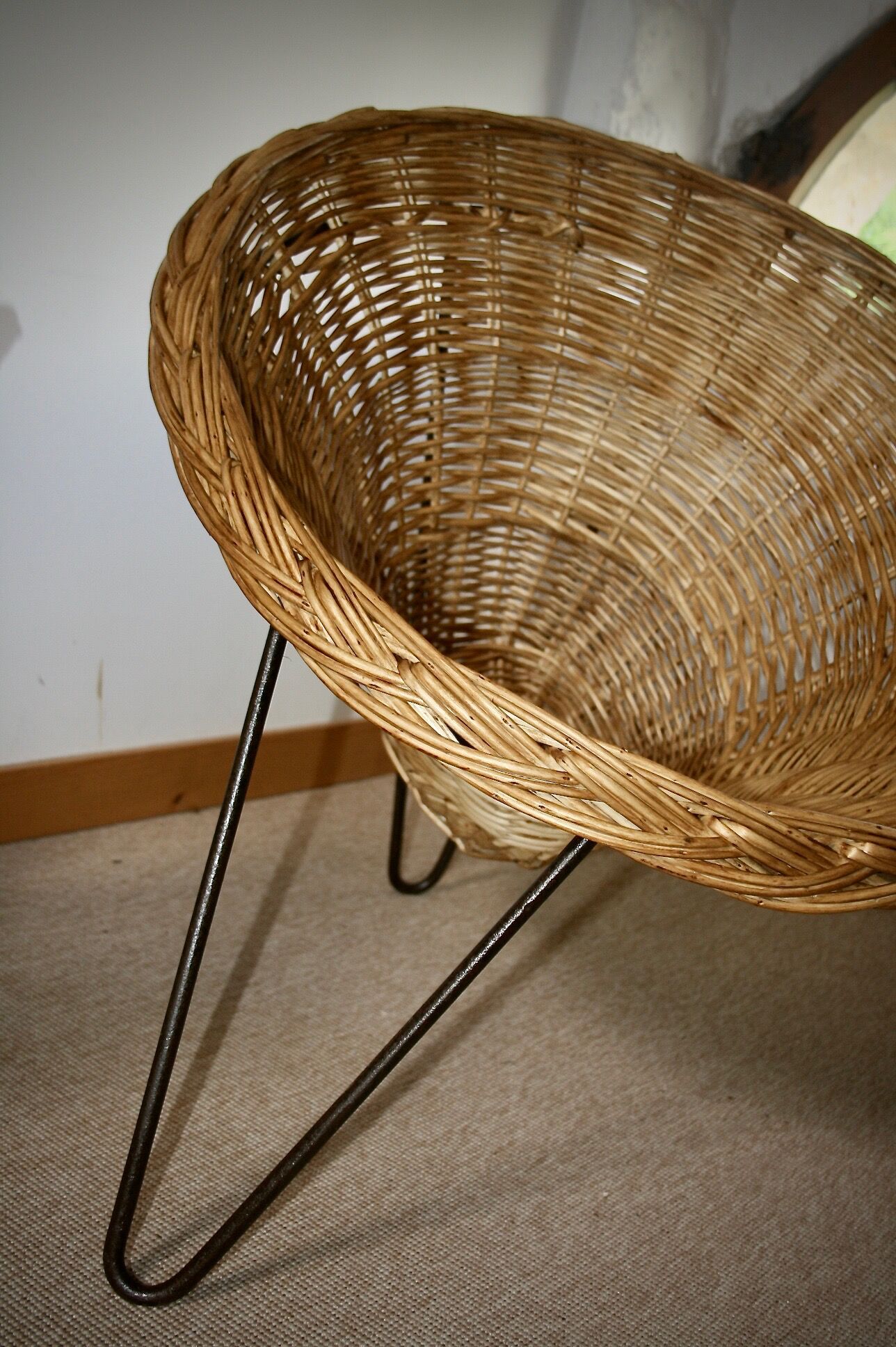 Wicker basket armchair in the 50s