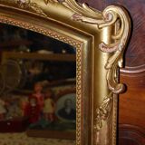 Miroir doré à fronton coquille de style Louis XV fin XIXème