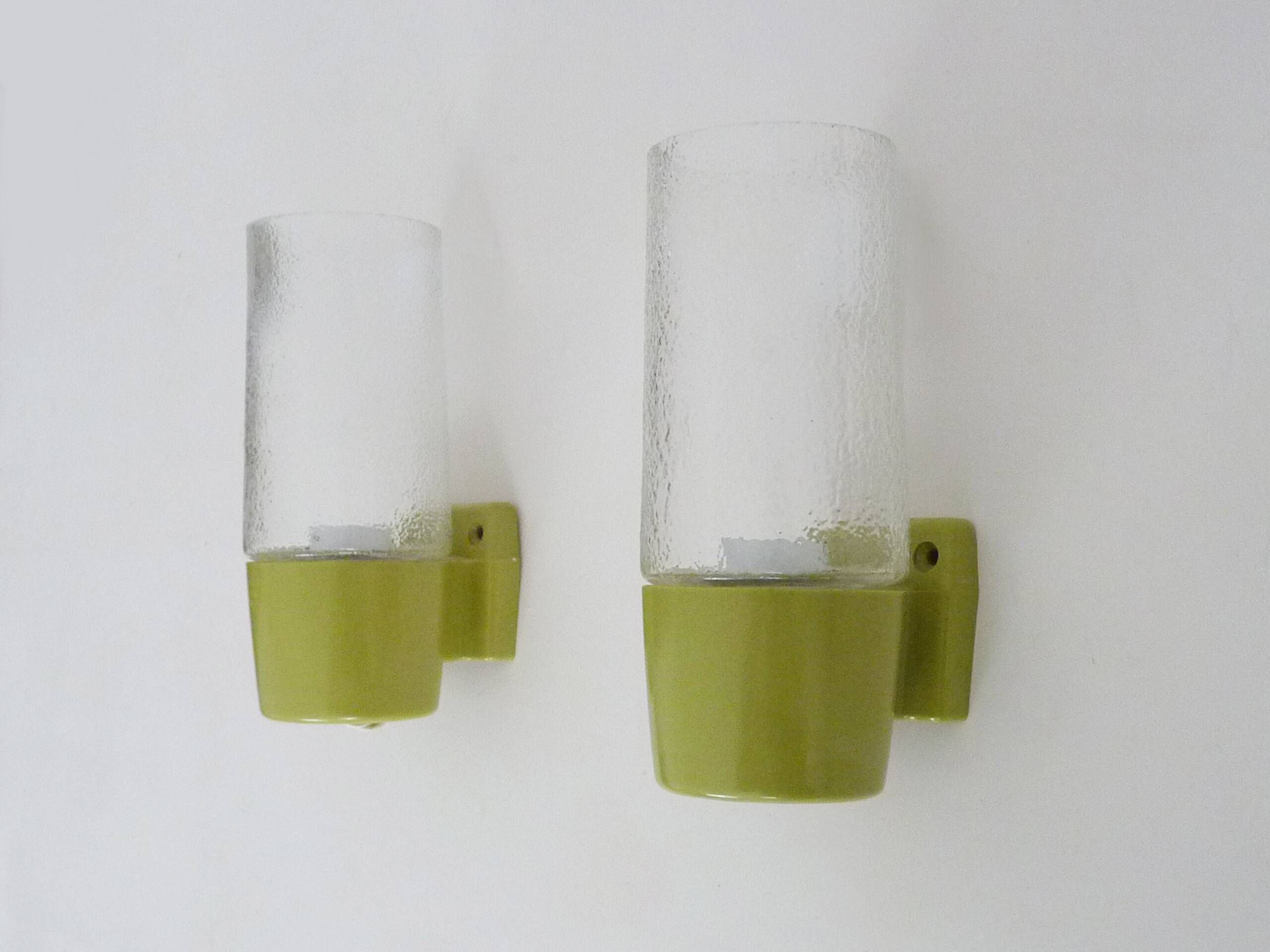 Pair of vintage pop wall lights in pastel green PVC and glass globe. 70s