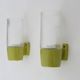 Pair of vintage pop wall lights in pastel green PVC and glass globe. 70s