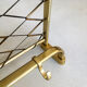 Fifties coat rack with brass net hat shelf