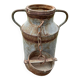 Old metal can or milk jug