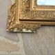 Old mirror in gilded wood and stucco 120 x 85 cm