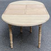 Table à manger ronde volets extensible Louis Philippe décapée en chêne brut