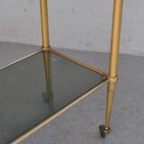 Serving style 1940 on gilded bronze smoked glass top
