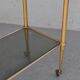 Serving style 1940 on gilded bronze smoked glass top