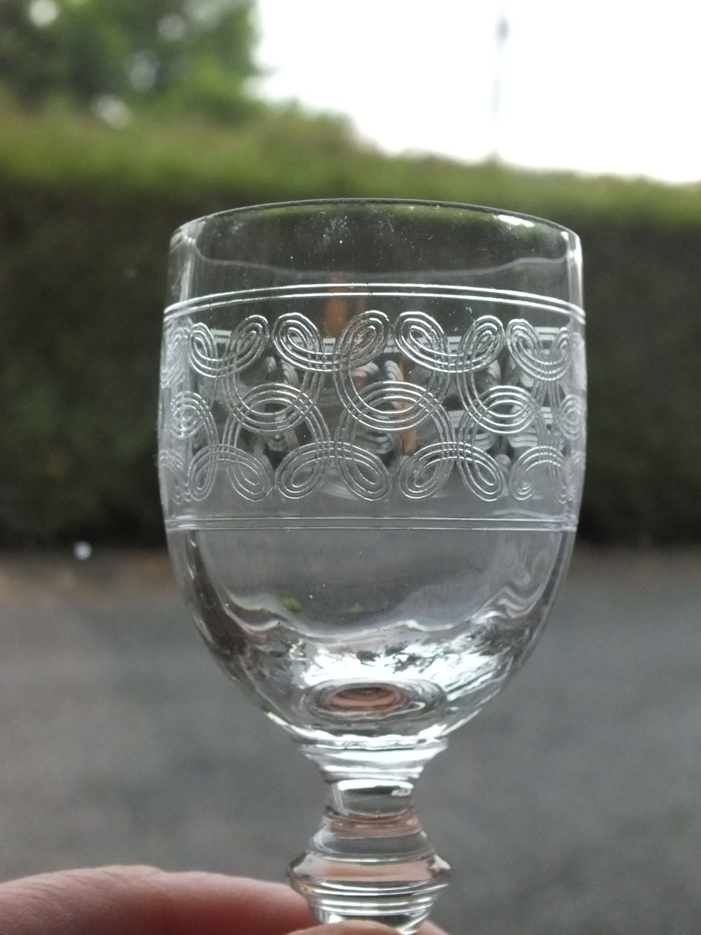 9 antique glasses in port or alcohol decorated with arabesques