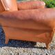Fauteuil club en cuir brun art déco 1930