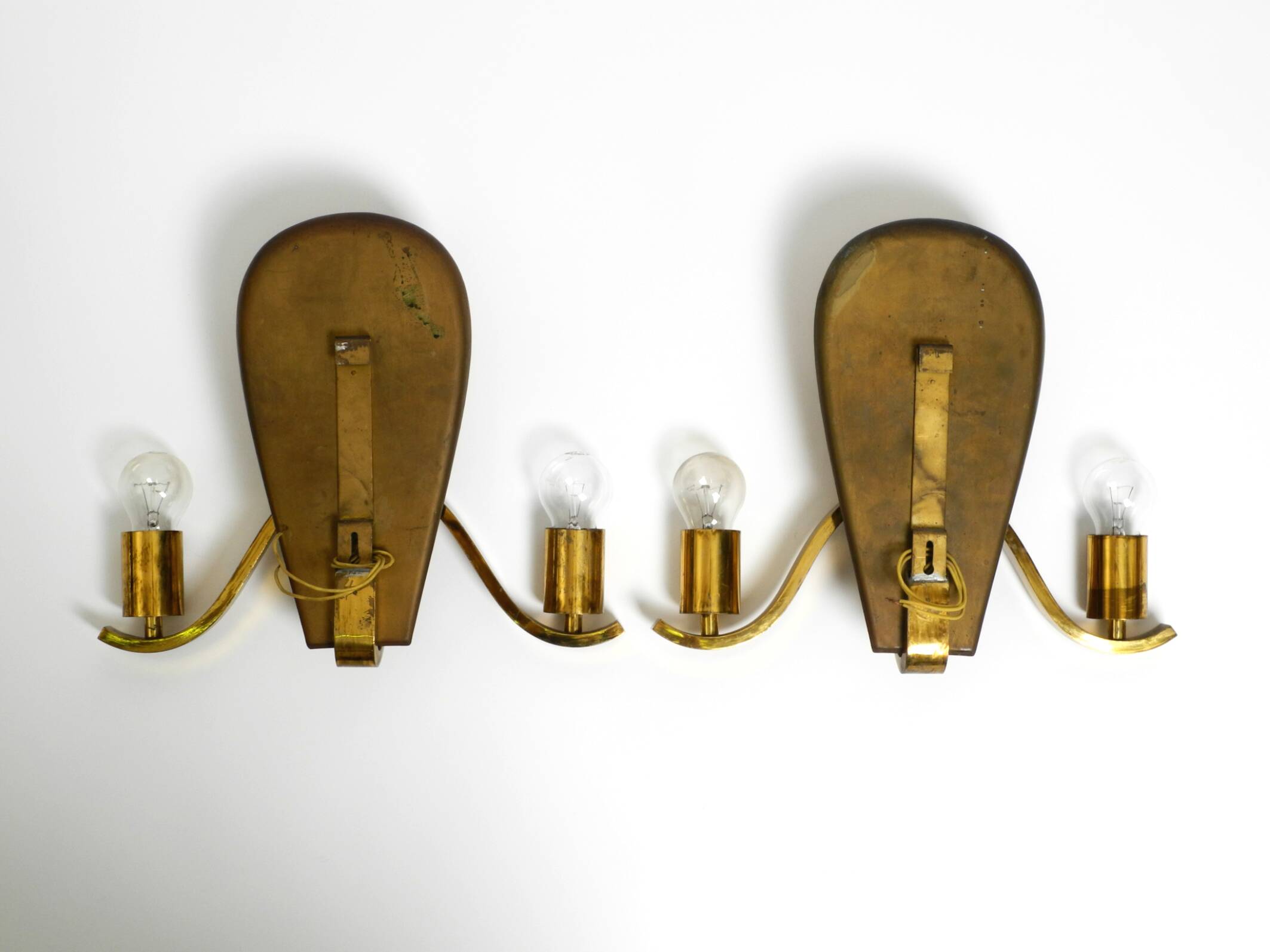 Pair of large heavy Mid Century brass wall lights from a German church