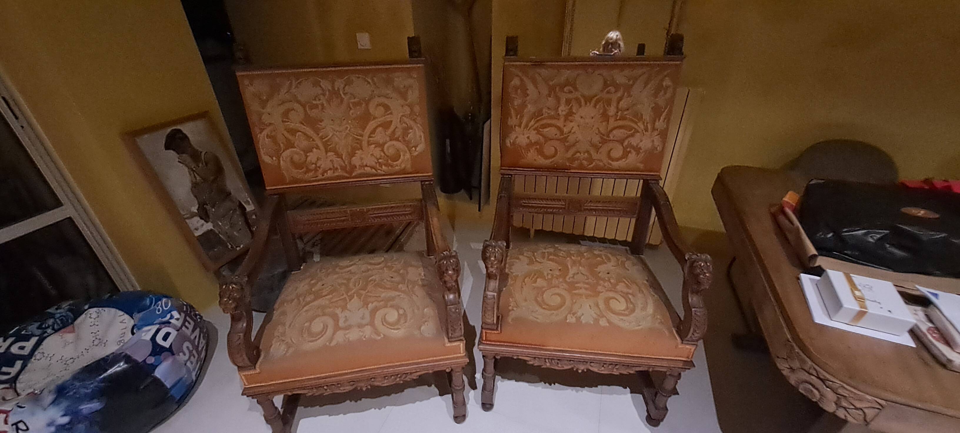 Antique lion head armchair