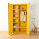 Wardrobe from the Profilsystem collection by Flötotto, 1970s, yellow HPL, beech frame