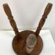 Old wooden tripod stool with ball feet