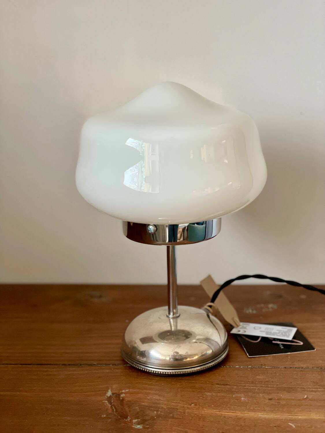 White opaline lamp with silver metal.