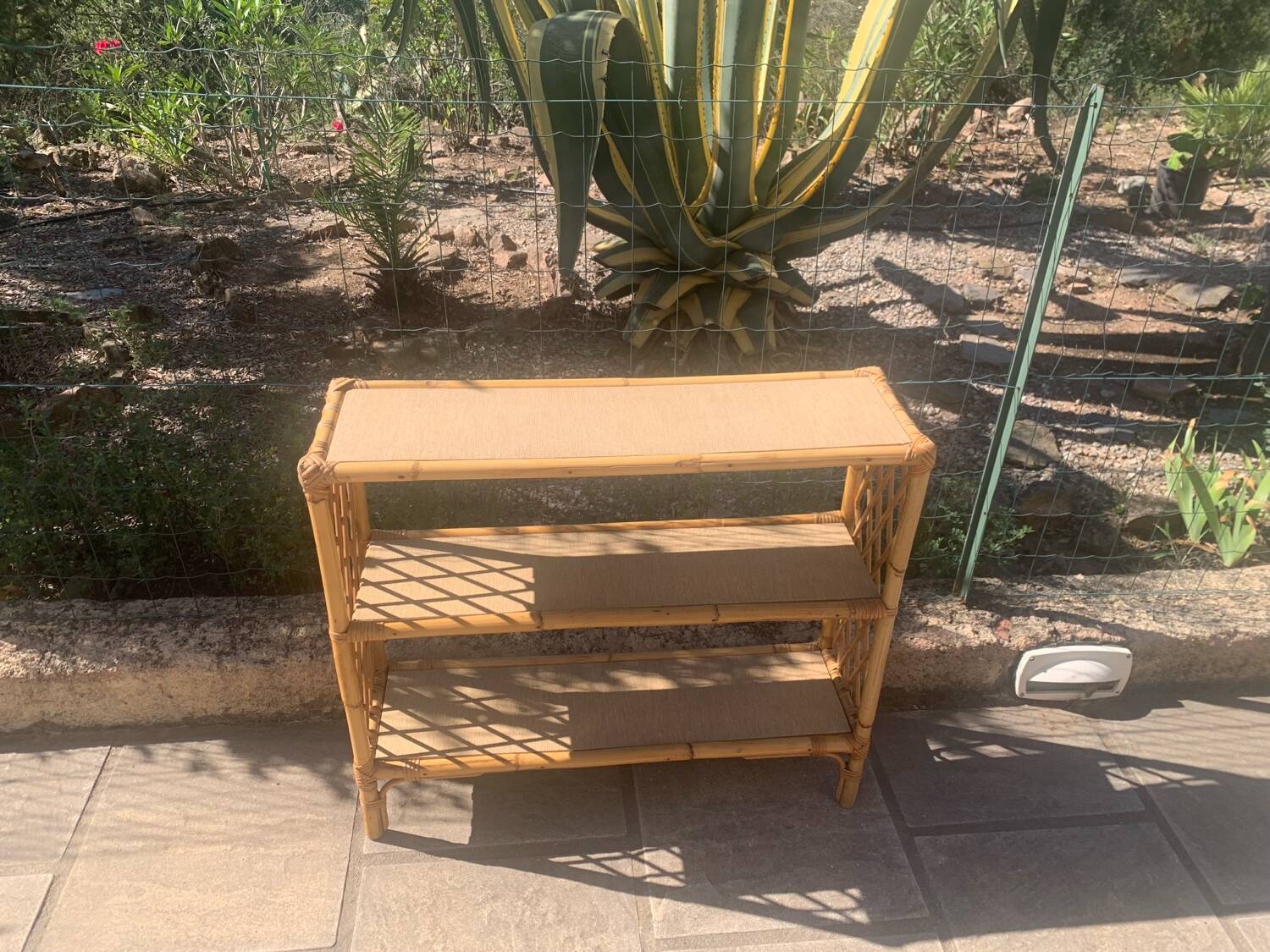Rattan shelf with crossbars 60's