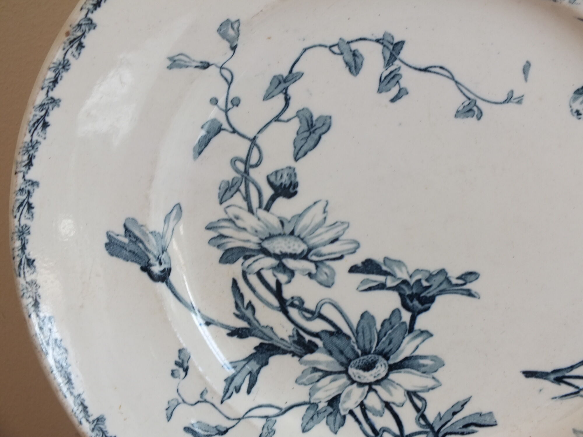 Old round dish in Terre de Fer Lunéville KG Marguerite