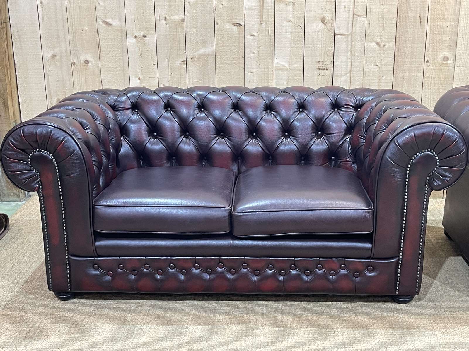 Pair of 2-seater leather Chesterfield sofas from the 1990s by Thomas LLOYD