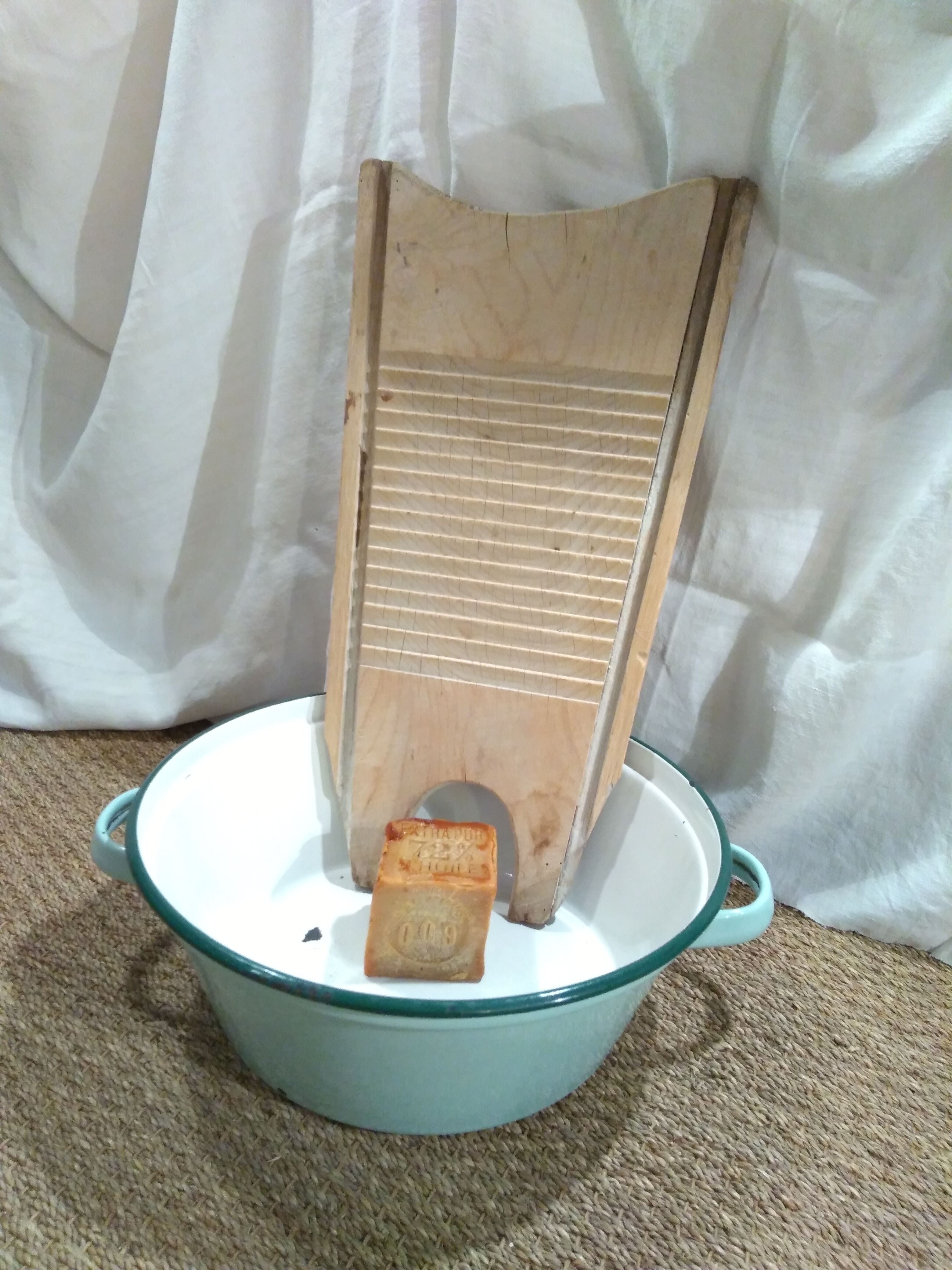 Ancient enamelled sheet metal basin