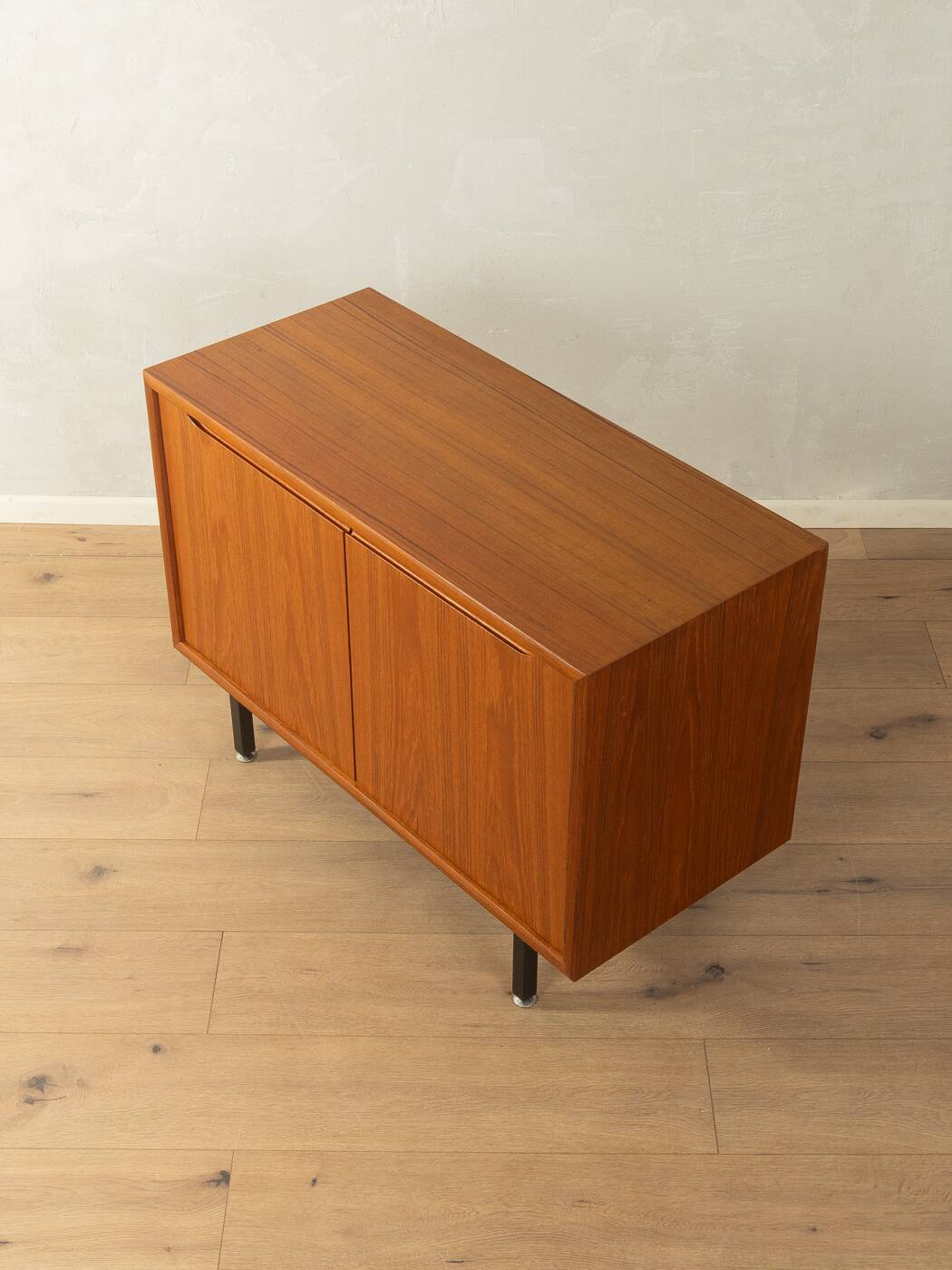 Classic chest of drawers from the 1960s with practical, closed storage space