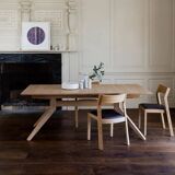 Wooden dining table with a cross extension.