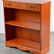 Pair of light walnut bookshelves with inlays and adjustable shelves.