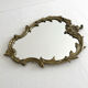 Miroir classique rocaille en laiton doré vintage