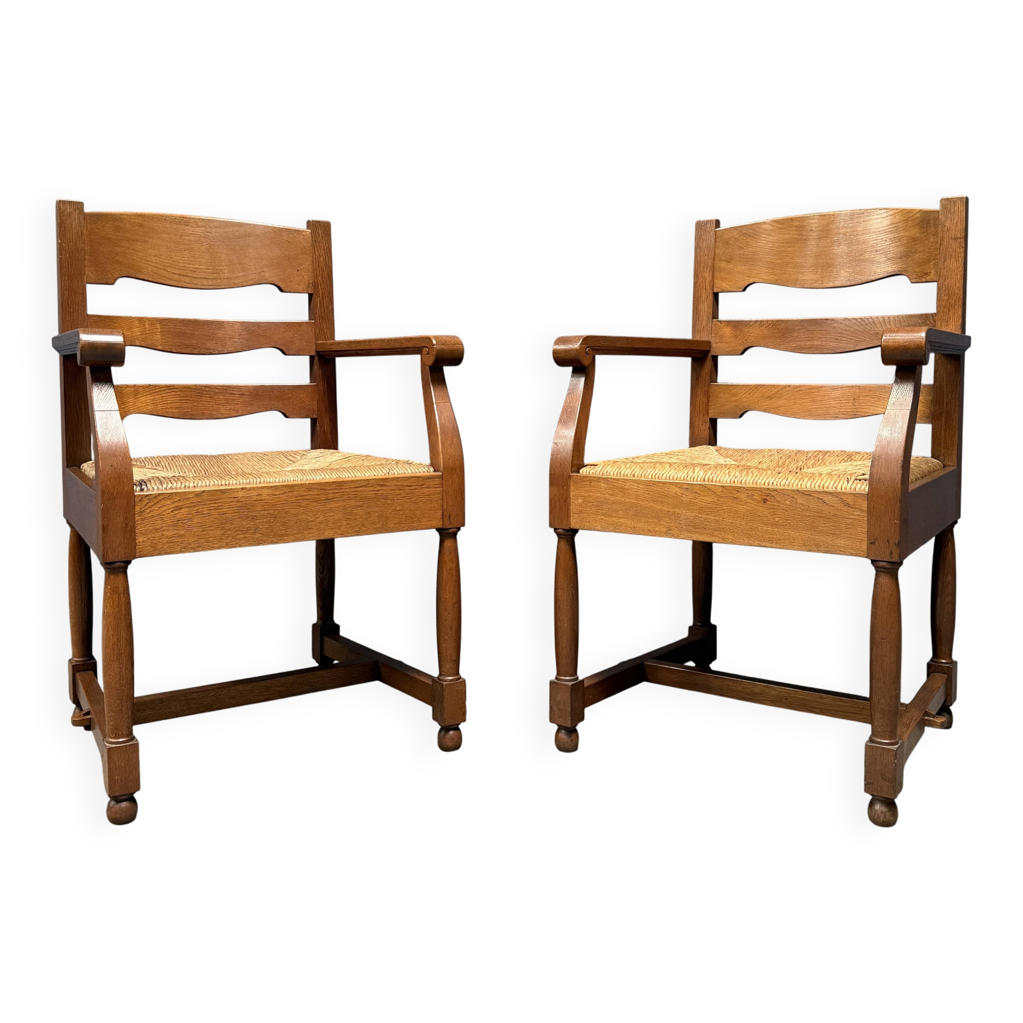 Set of two Dutch oak armchairs with rush seats