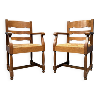 Set of two Dutch oak armchairs with rush seats