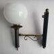 Empire style torch wall sconce